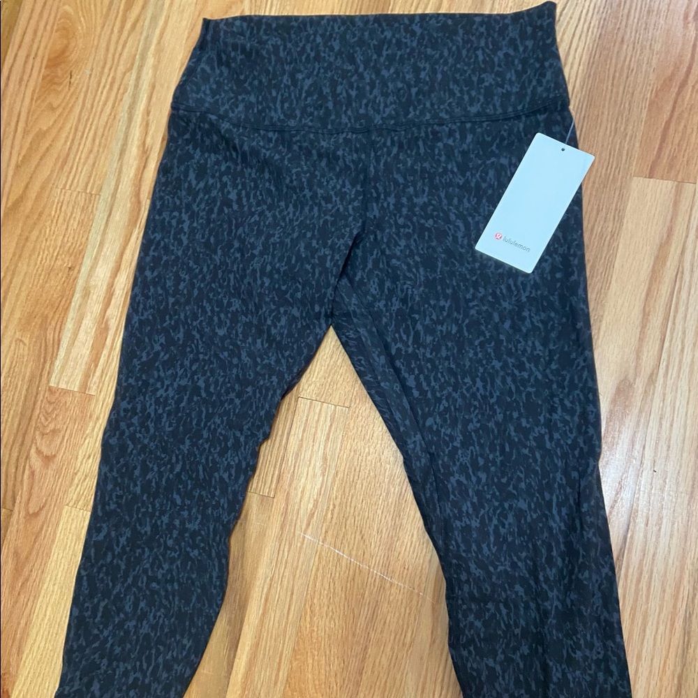 Lululemon 25’’ Align HR Pant. Color is a deep camo coal multi.